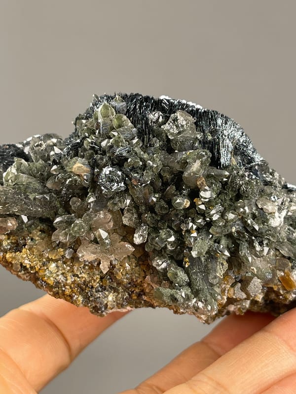 Hematite from Inner Mongolia, China: quartz points over a rough brown base.