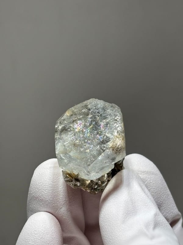 Hexagonal aquamarine with rainbow flash and mica from Xuebaoding, Sichuan, China, view 3 of 6