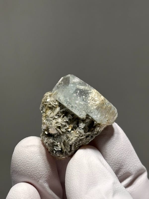 Hexagonal aquamarine with rainbow flash and mica from Xuebaoding, Sichuan, China, view 4 of 6