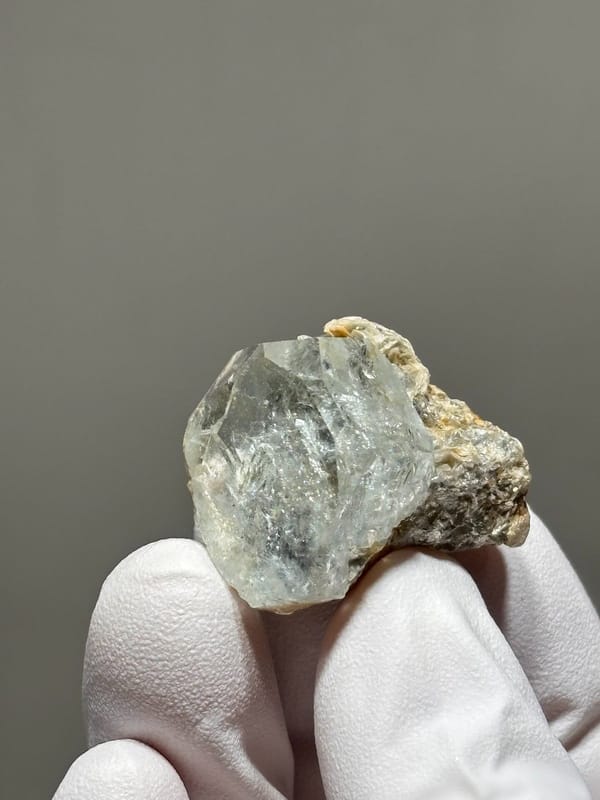 Hexagonal aquamarine with rainbow flash and mica from Xuebaoding, Sichuan, China, view 5 of 6