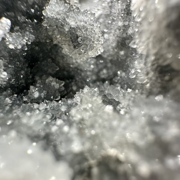 Hexagonal calcite plate on quartz, from Fujian, China, front view in daylight, view 11 of 11