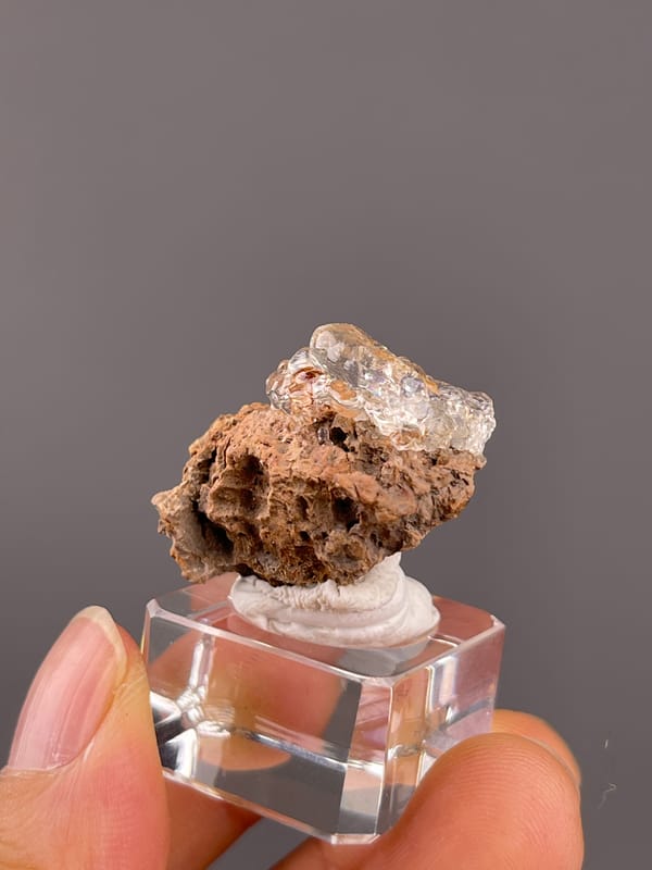 Hyalite Opal from Mexico: front view of clear coating and porous matrix.