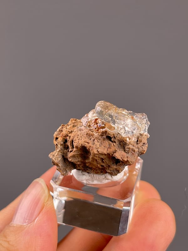 Hyalite Opal from Mexico: oblique view of the transparent upper growths.