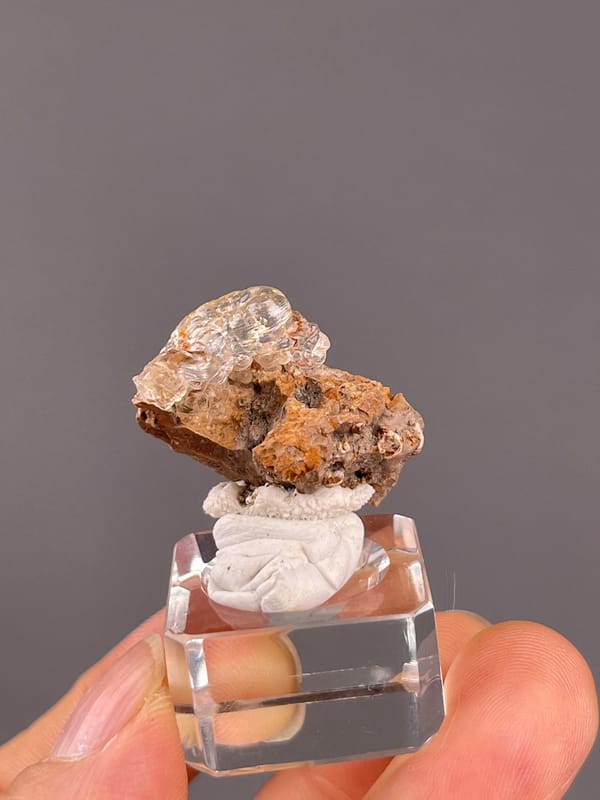 Hyalite Opal from Mexico: reverse edge showing the glassy coating.