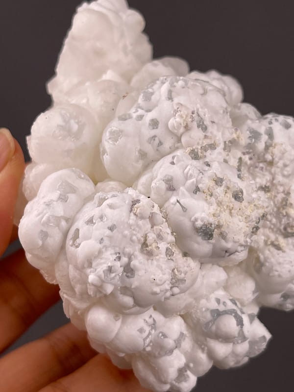 Hydrozincite from Yunnan, China: gray details between granular white lobes.