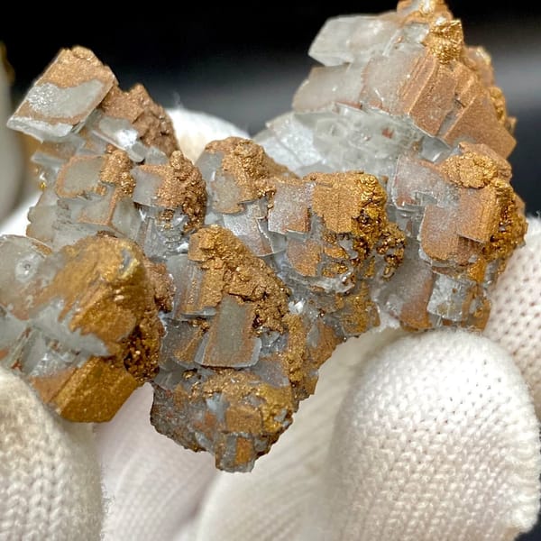 Iceland spar calcite rhombs half-coated in rusty iridescent pyrite from Hunan, China, view 9 of 9