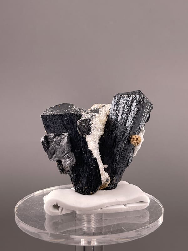 Ilvaite specimen from Inner Mongolia, China featuring black striated prismatic crystals
