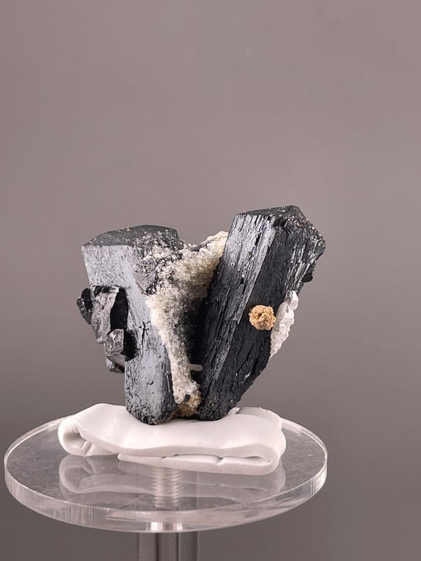 Ilvaite specimen from Inner Mongolia, China, defined by black striated prismatic crystals