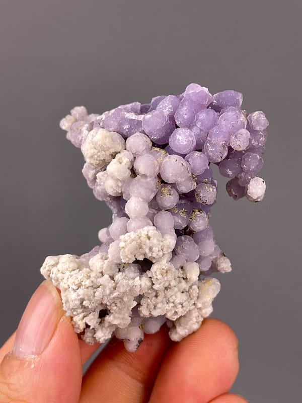 Grape Agate specimen from Indonesia showing lavender botryoidal chalcedony spheres