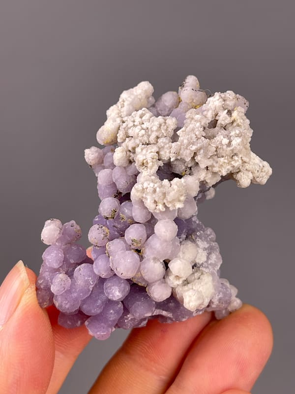 Grape Agate specimen from Indonesia displaying lavender botryoidal chalcedony spheres