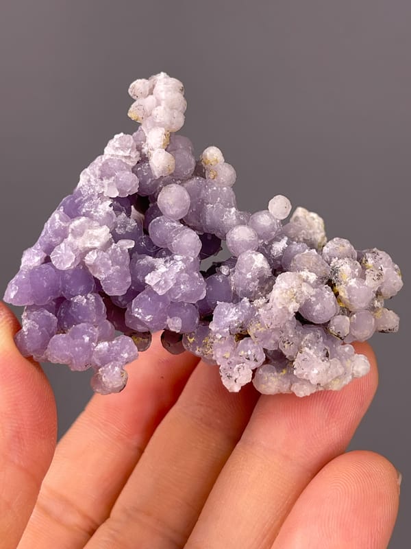 Grape Agate specimen from Indonesia highlighting lavender botryoidal chalcedony spheres