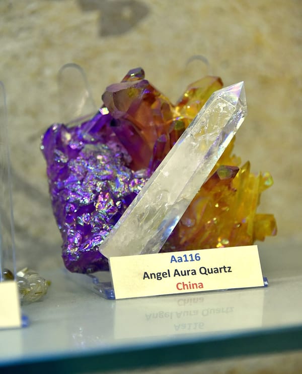 "Angel aura" quartz from China — natural quartz given an iridescent metallic sheen by a vapour-deposited coating.
