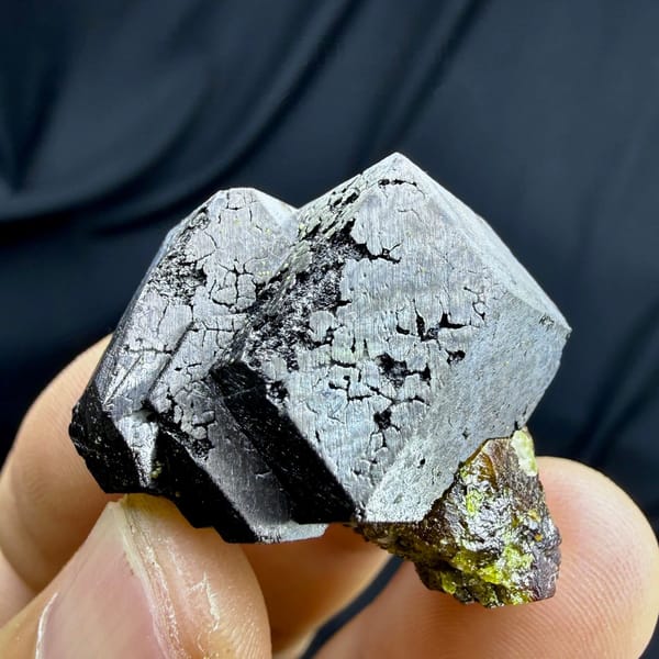 Bright etched magnetite crystal on garnet and epidote from Inner Mongolia, China