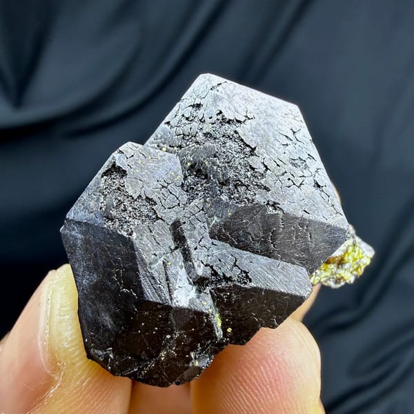Bright etched magnetite crystal on garnet and epidote from Inner Mongolia, China, view 2 of 6