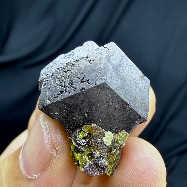 Bright etched magnetite crystal on garnet and epidote from Inner Mongolia, China, view 3 of 6
