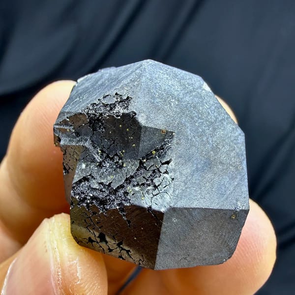 Bright etched magnetite crystal on garnet and epidote from Inner Mongolia, China, view 5 of 6