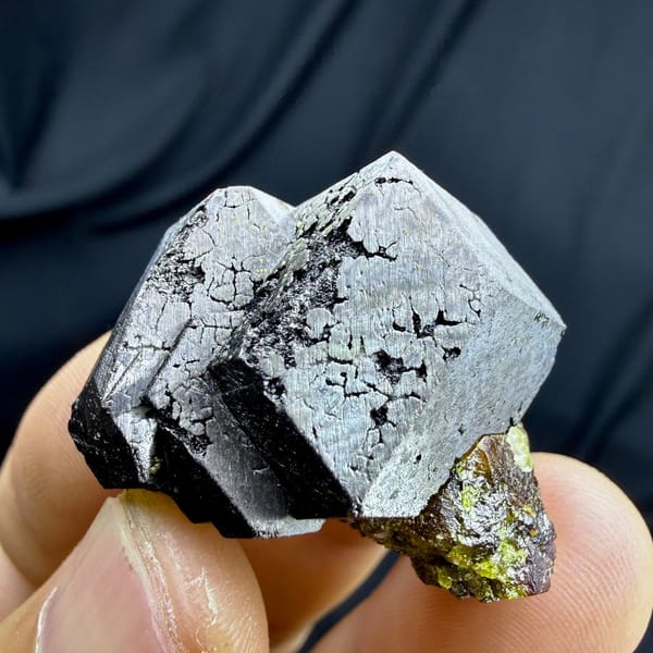 Bright etched magnetite crystal on garnet and epidote from Inner Mongolia, China, view 6 of 6