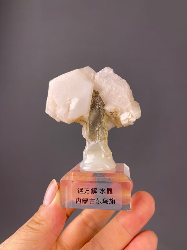 Manganese-bearing Calcite, Dong Ujimqin Banner, Inner Mongolia, China, featuring pale pink calcite and smoky quartz