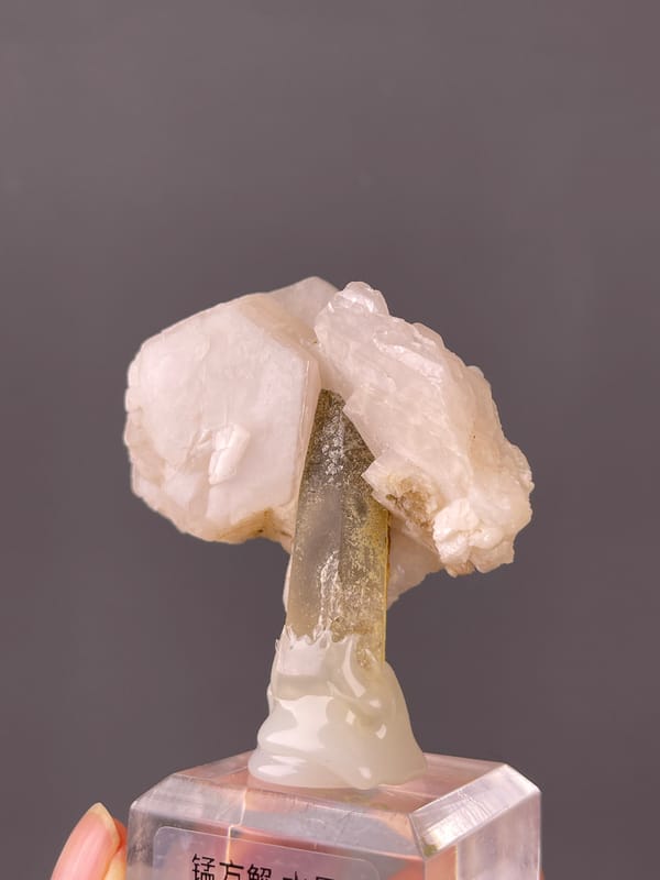 Manganese-bearing Calcite, Dong Ujimqin Banner, Inner Mongolia, China, presenting pale pink calcite and smoky quartz