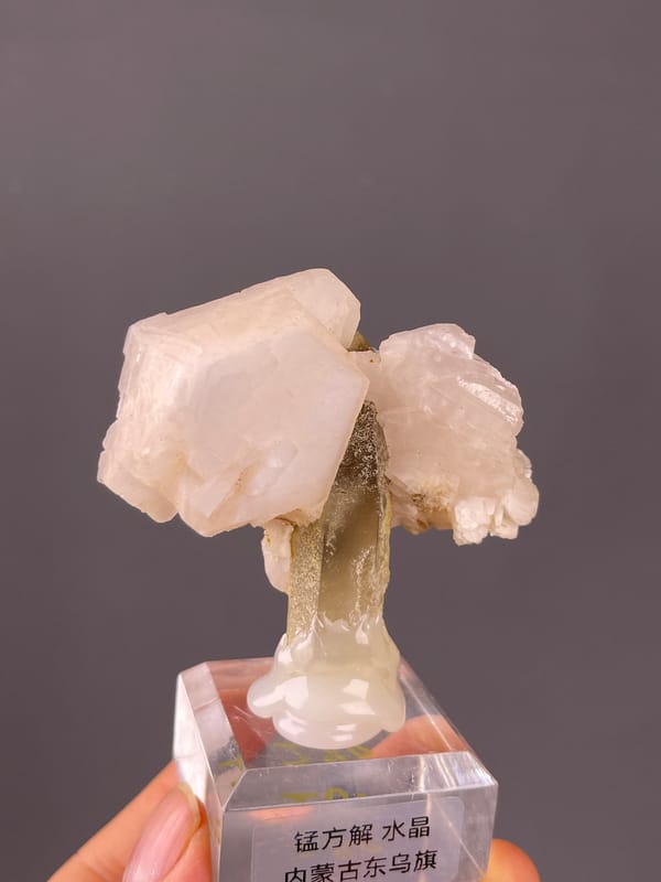 Manganese-bearing Calcite, Dong Ujimqin Banner, Inner Mongolia, China, displaying pale pink calcite and smoky quartz