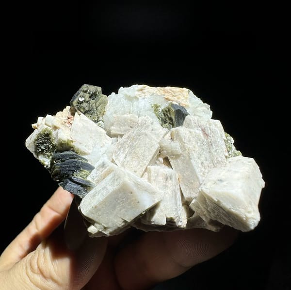 Blocky cream feldspar crystals with dark green mica from Yunxiao, Fujian, China