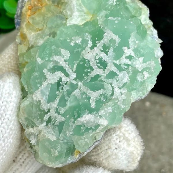 Mint-green sugar fluorite with white druse network from Fujian, China, view 3 of 9
