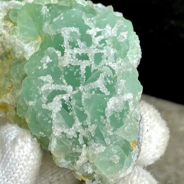 Mint-green sugar fluorite with white druse network from Fujian, China, view 7 of 9