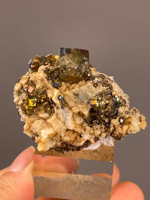Mirror-luster Pyrite specimen from Shangbao Mine, Hunan, China featuring brassy mirror-luster metallic crystals