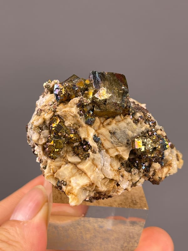 Mirror-luster Pyrite specimen from Shangbao Mine, Hunan, China showing brassy mirror-luster metallic crystals