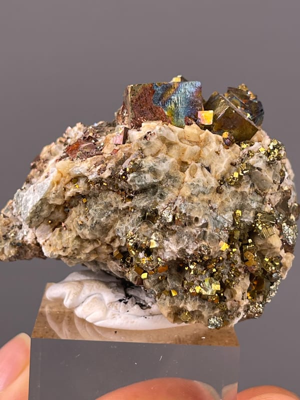Mirror-luster Pyrite specimen from Shangbao Mine, Hunan, China highlighting brassy mirror-luster metallic crystals