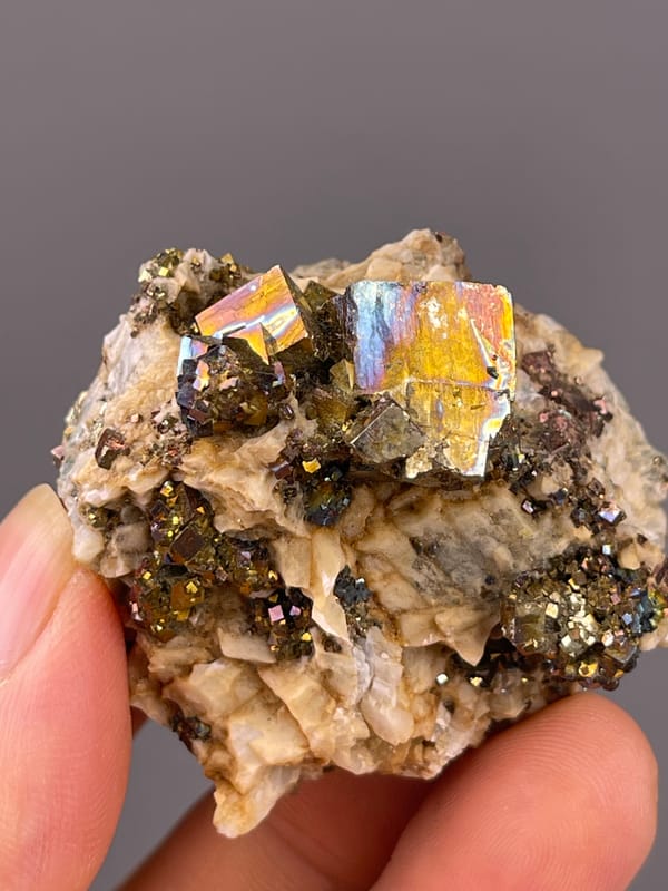 Mirror-luster Pyrite specimen from Shangbao Mine, Hunan, China, characterized by brassy mirror-luster metallic crystals