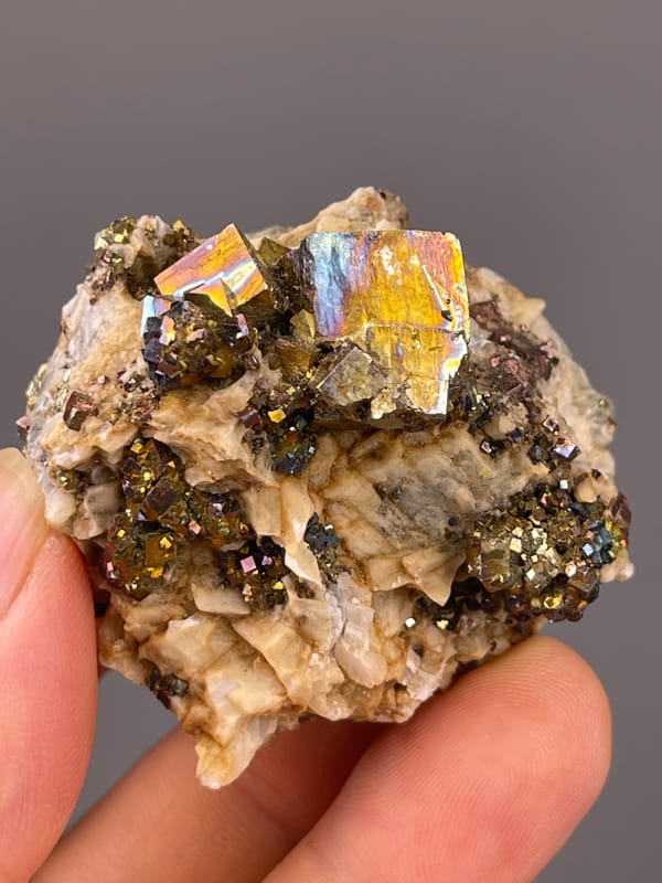 Mirror-luster Pyrite specimen from Shangbao Mine, Hunan, China bearing brassy mirror-luster metallic crystals