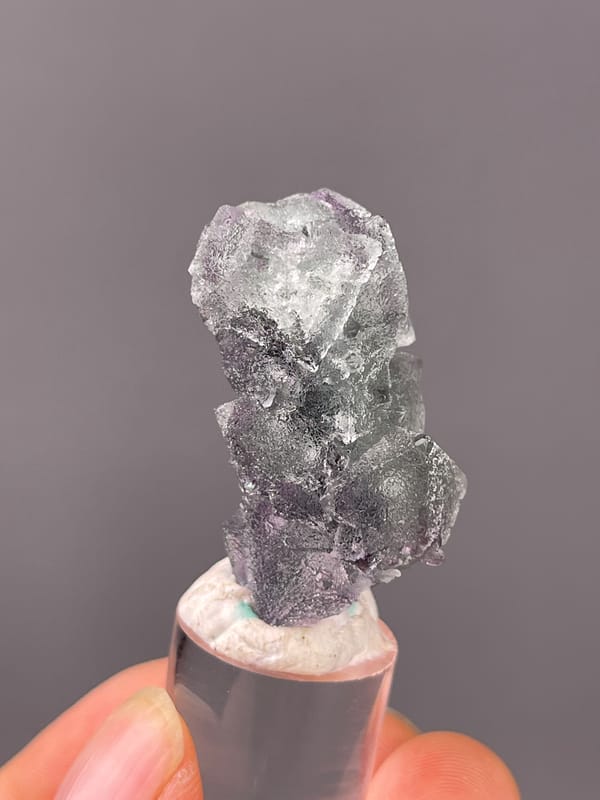 Gray-purple fluorite with frosted faces visible on octahedral fluorite specimen from Sanming, Fujian, China