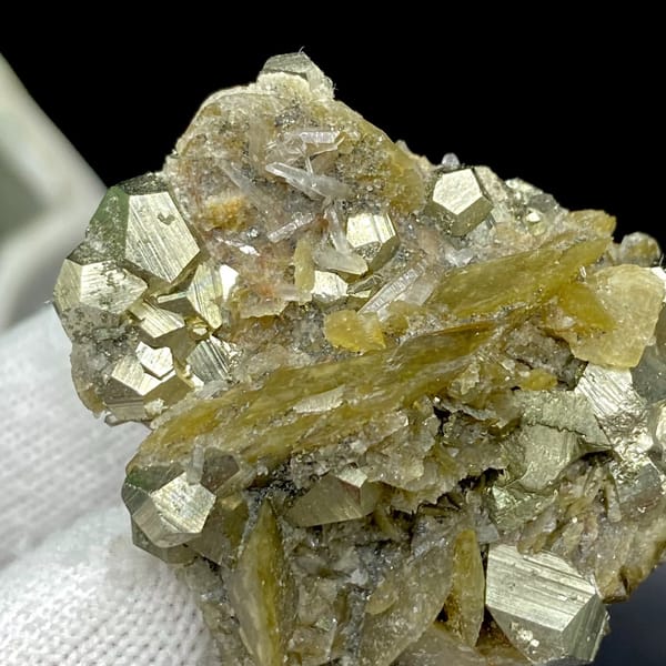 Olive siderite blades studded with pyrite dodecahedra from Guizhou, China, view 3 of 9