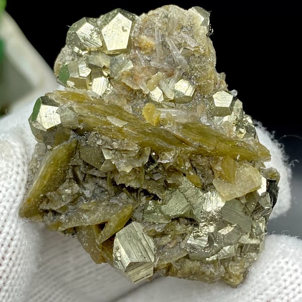 Olive siderite blades studded with pyrite dodecahedra from Guizhou, China, view 4 of 9