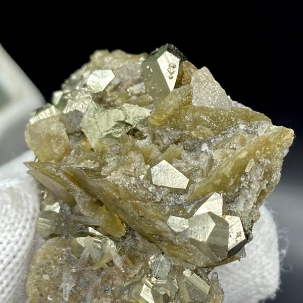 Olive siderite blades studded with pyrite dodecahedra from Guizhou, China, view 5 of 9