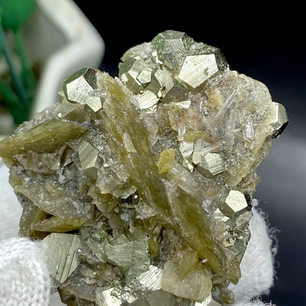 Olive siderite blades studded with pyrite dodecahedra from Guizhou, China, view 6 of 9