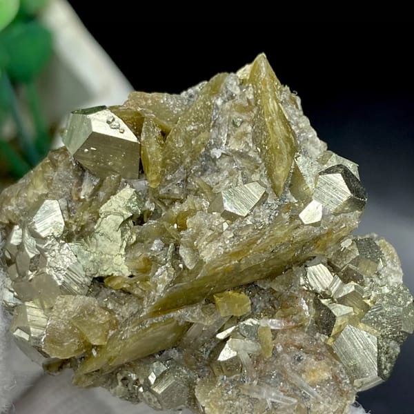 Olive siderite blades studded with pyrite dodecahedra from Guizhou, China, view 8 of 9