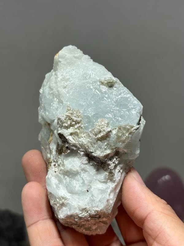 Opaque aquamarine single crystal from Xuebaoding, Sichuan, China, reverse side