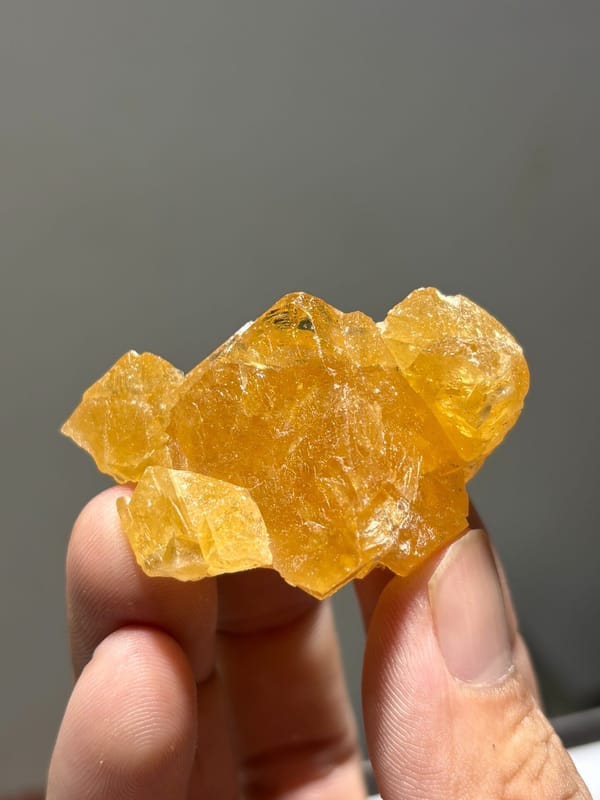 Orange scheelite crystal group from Xuebaoding, Sichuan, China, second angle