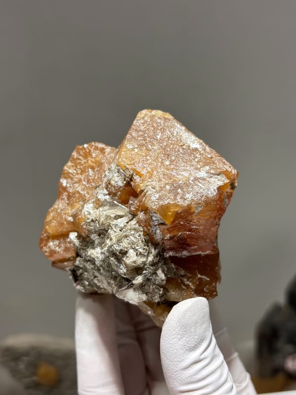 Large orange scheelite crystal group from Xuebaoding, Sichuan, China, second angle