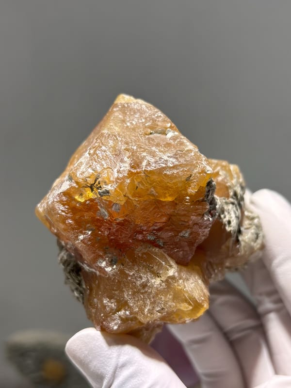 Large orange scheelite crystal group from Xuebaoding, Sichuan, China, top view