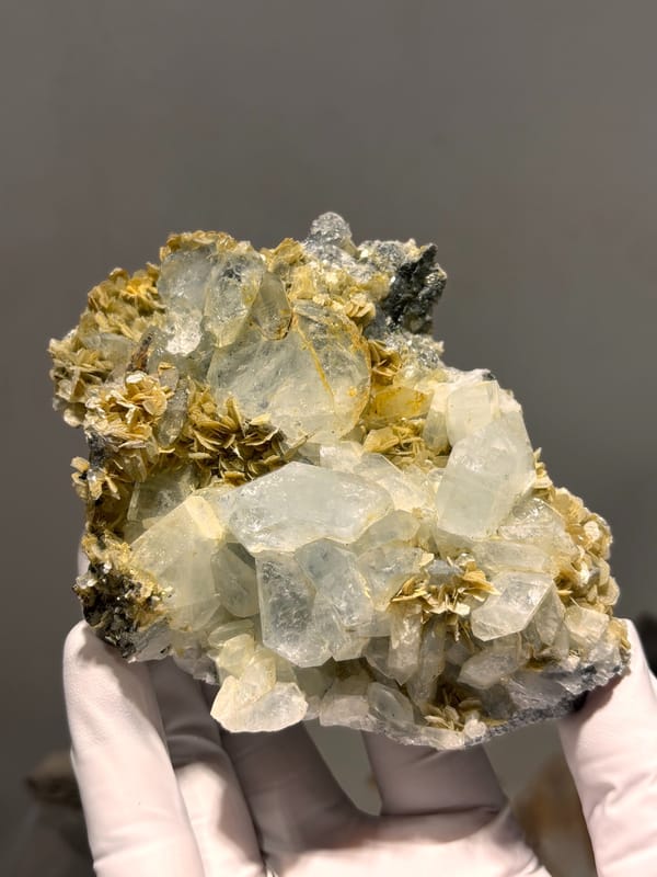 Plate of pale aquamarine crystals on mica from Xuebaoding, Sichuan, China, second angle