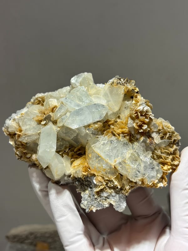 Plate of pale aquamarine crystals on mica from Xuebaoding, Sichuan, China, top view