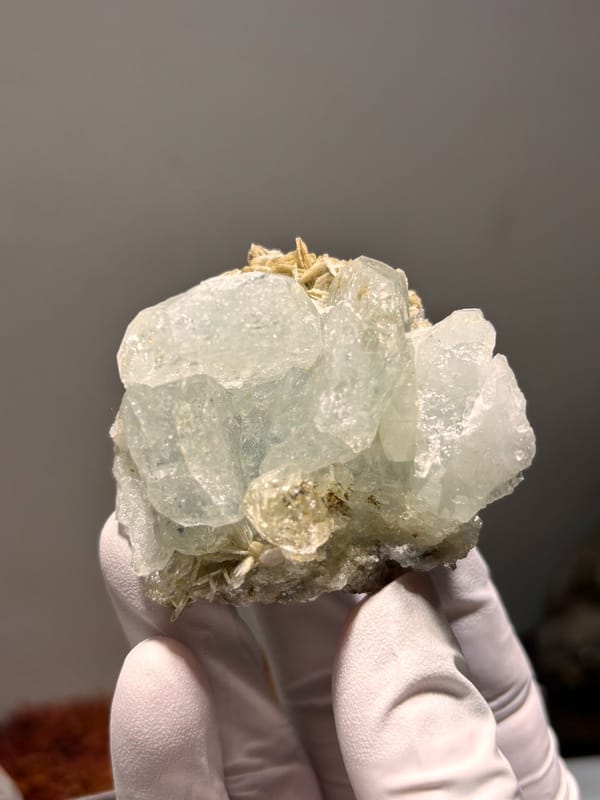 Pale aquamarine cluster on mica from Xuebaoding, Sichuan, China, second angle