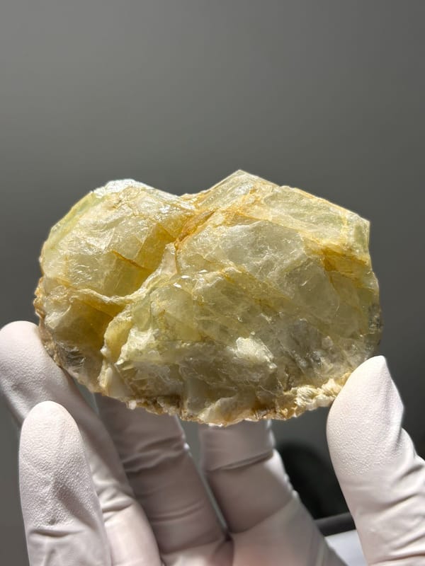Pale aquamarine cluster on mica from Xuebaoding, Sichuan, China, close-up of the crystal faces, third view