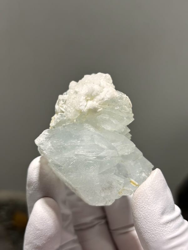 Pale blue aquamarine with stepped faces from Xuebaoding, Sichuan, China, view 3 of 5