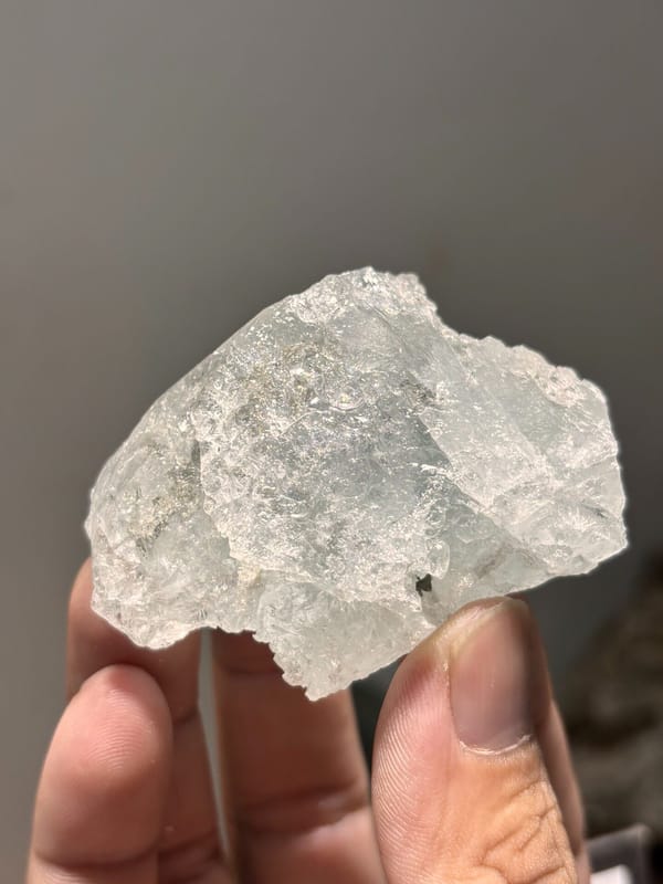 Pale blue aquamarine block with etched faces from Xuebaoding, Sichuan, China, second angle