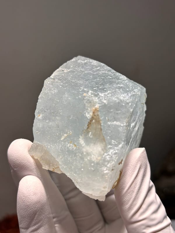 Pale blue aquamarine block from Xuebaoding, Sichuan, China, close-up of the crystal faces