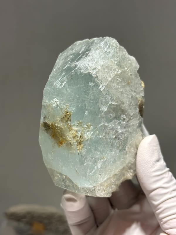 Pale blue-green aquamarine block from Xuebaoding, Sichuan, China, close-up of the crystal faces